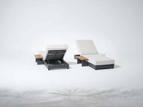 Two modern lounge chairs with white cushions and black frames- Jardina Premium Modern Outdoor Patio Furniture