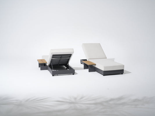 Two modern lounge chairs with white cushions and black frames- Jardina Premium Modern Outdoor Patio Furniture